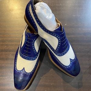 Men’s two tone wing tip shoe